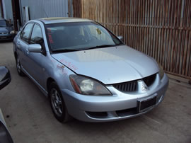2004 MITSUBISHI LANCER 4 DOOR SEDAN OZ MODEL 2.0L MT FWD COLOR SILVER 143654