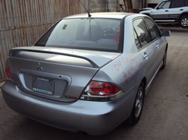 2004 MITSUBISHI LANCER 4 DOOR SEDAN OZ MODEL 2.0L MT FWD COLOR SILVER 143654