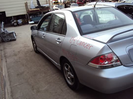 2004 MITSUBISHI LANCER 4 DOOR SEDAN OZ MODEL 2.0L MT FWD COLOR SILVER 143654