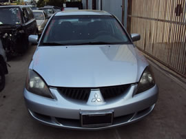 2004 MITSUBISHI LANCER 4 DOOR SEDAN OZ MODEL 2.0L MT FWD COLOR SILVER 143654