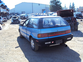 1991 DODGE COLT 2 DOOR HATCHBACK STANDARD MODEL 1.5L MT 5SPD FWD COLOR BLUE  STK # 133626