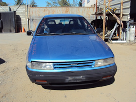 1991 DODGE COLT 2 DOOR HATCHBACK STANDARD MODEL 1.5L MT 5SPD FWD COLOR BLUE  STK # 133626