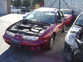 1996 saturn sl2 model 4 door sedan 1.9l dohc engine at fwd color burgandy