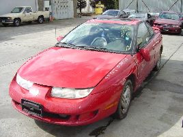 1997 SATURN  SC2 MODEL 2 DOOR COUPE 1.9L DOHC MT FWD COLOR RED