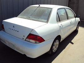 2003 MITSUBISHI LANCER COLOR WHITE, STK# 109782