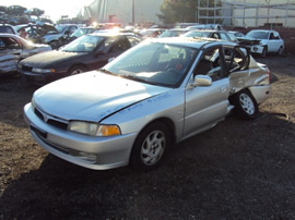 1999 MITSUBISHI MIRAGE LS MODEL 4 DOOR SEDAN 1.8L AT FWD COLOR SILVER STK 113586
