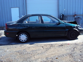 1999 MITSUBISHI MIRAGE 4 DOOR SEDAN LS MODEL 1.8L AT FWD COLOR GREEN STK 123606