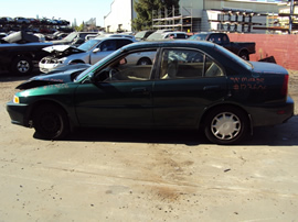 1999 MITSUBISHI MIRAGE 4 DOOR SEDAN LS MODEL 1.8L AT FWD COLOR GREEN STK 123606